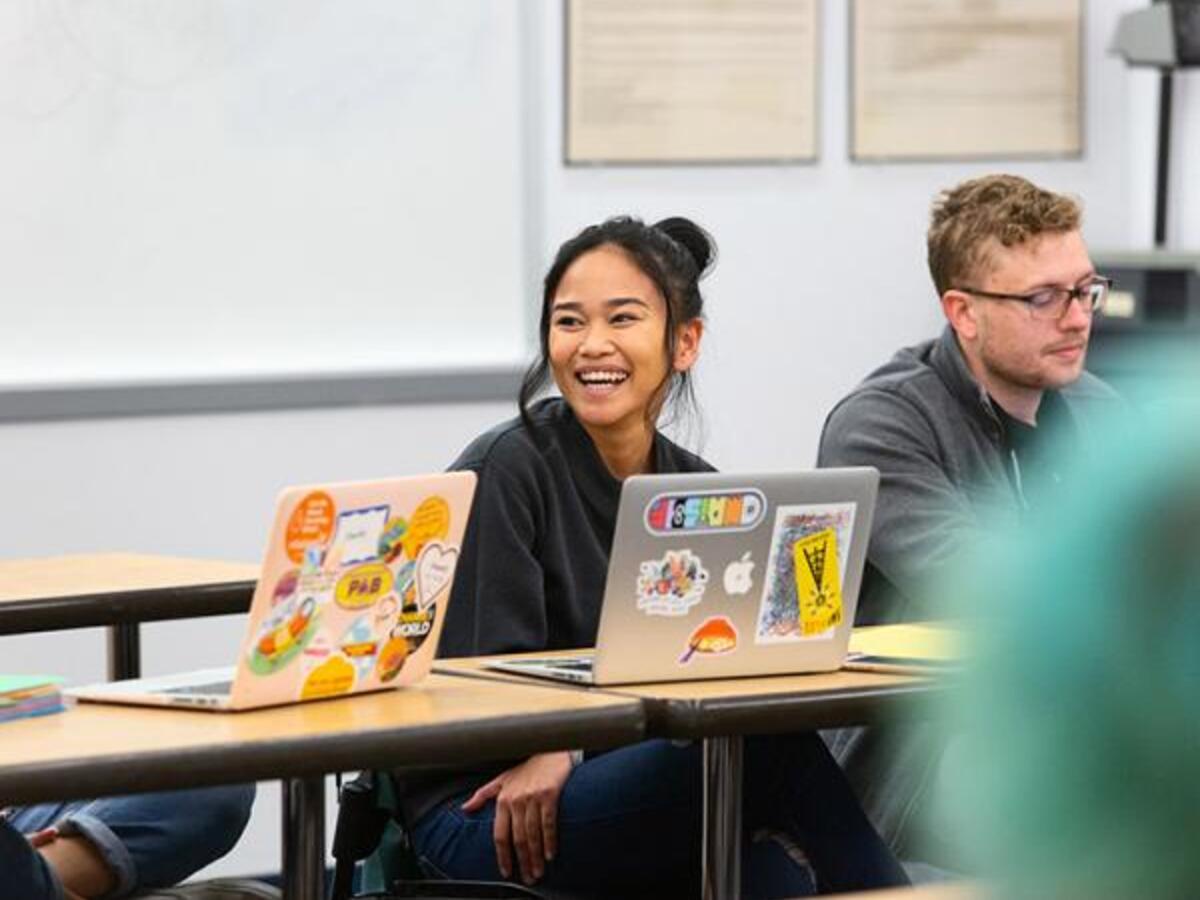 Students at ASU on a computer